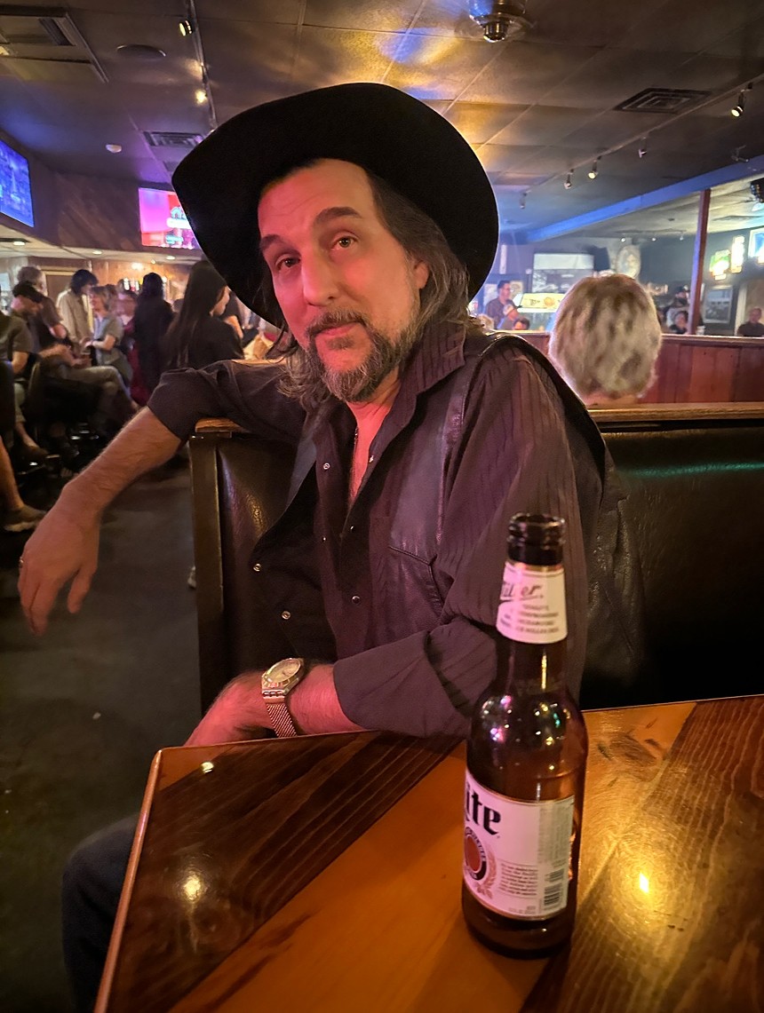 A country singer in a bar.