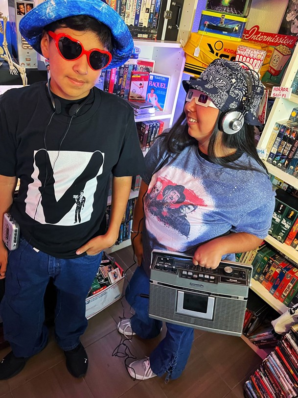 Two people in retro clothing.