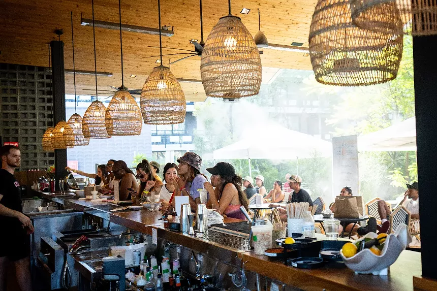 People sitting at a bar.