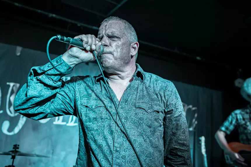 A man singing.
