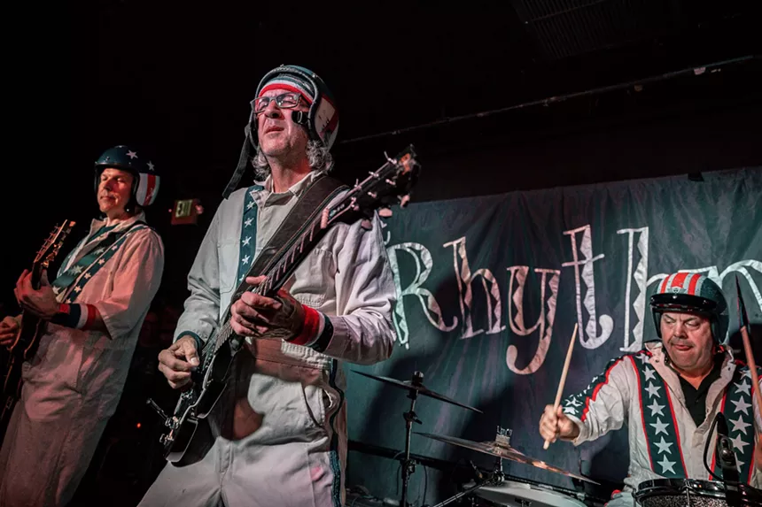 A band performing in costumes.