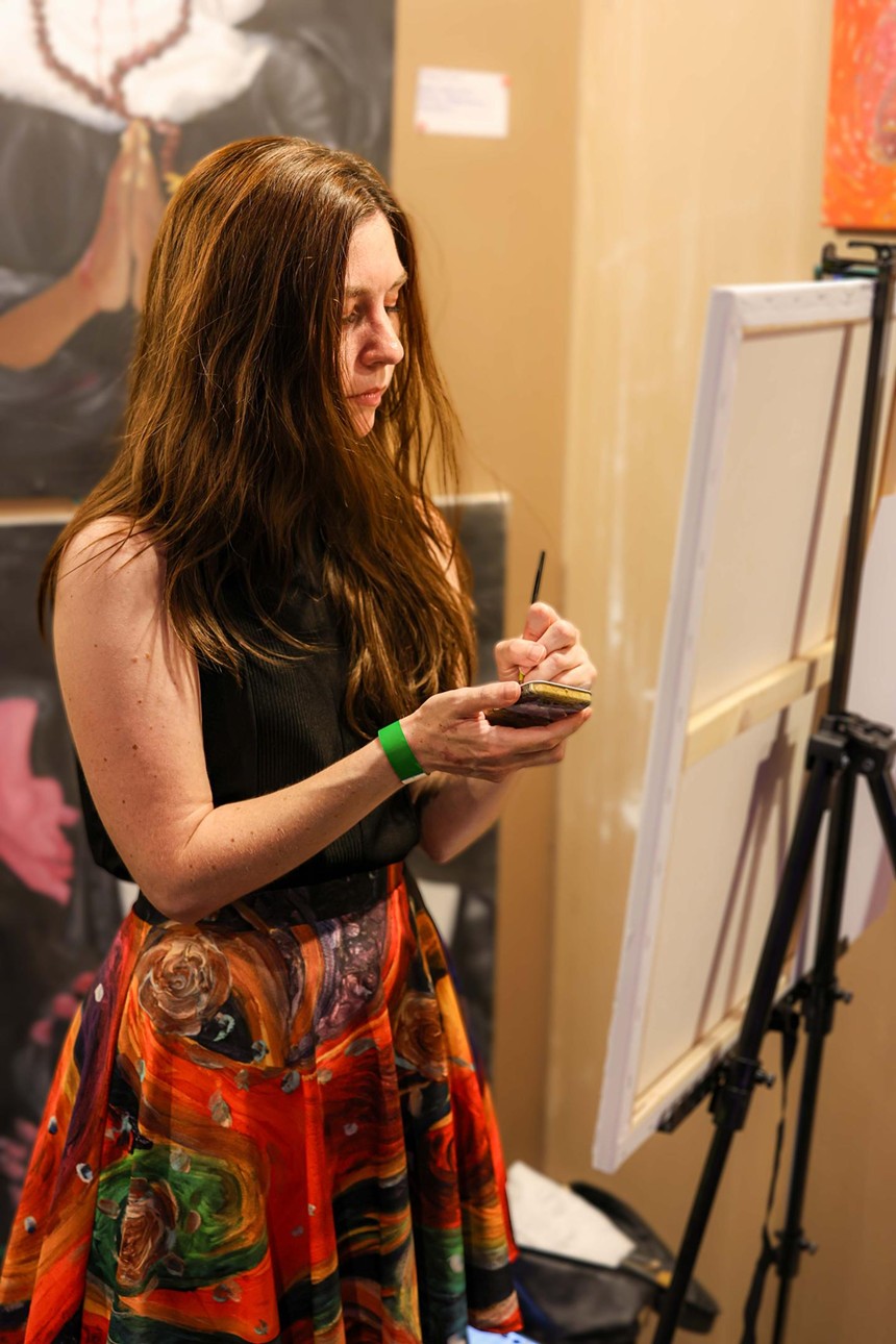 A woman painting.