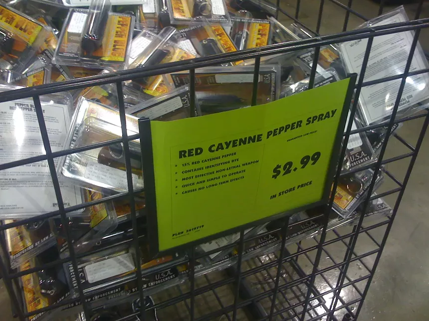 A bin of pepper spray at a retail store.