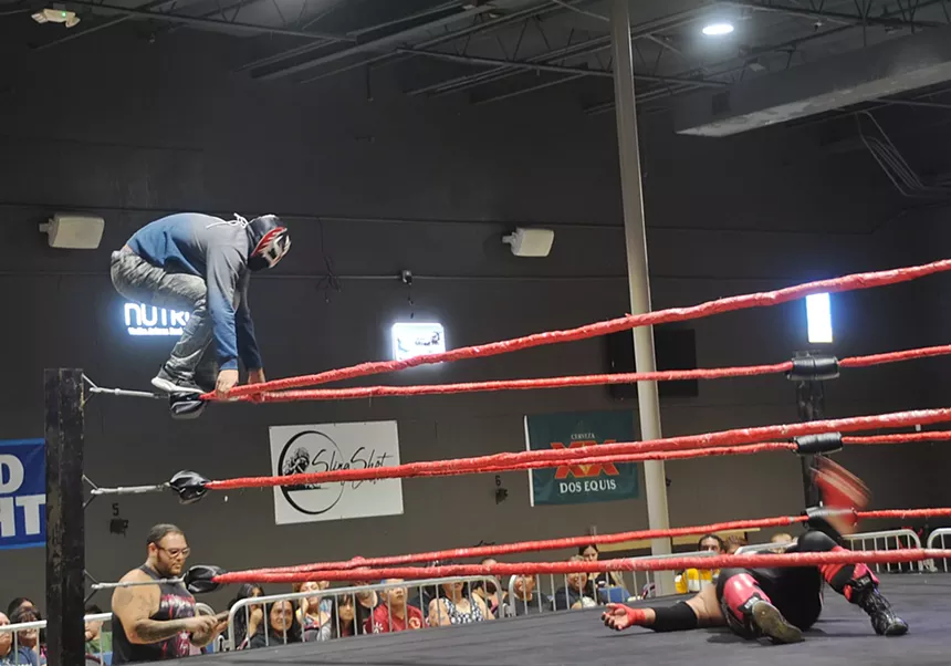 A pro wrestling match between two wrestlers.