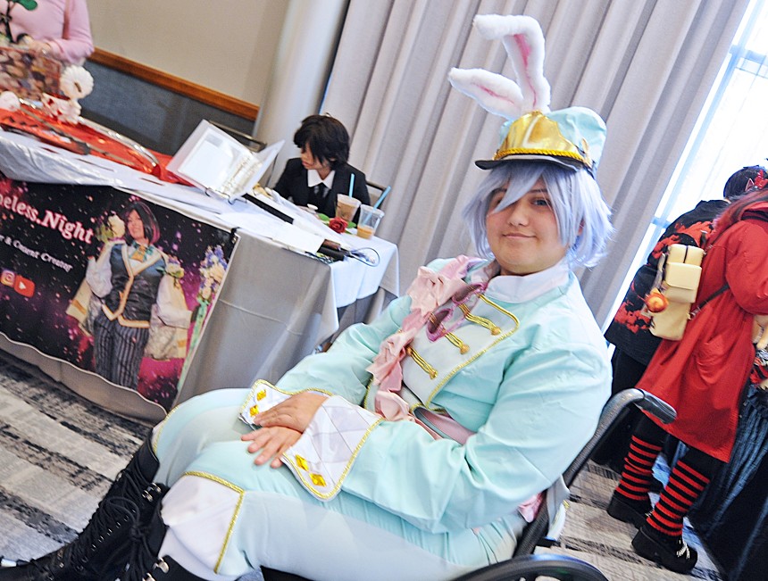 A person wearing a costume in a wheelchair.