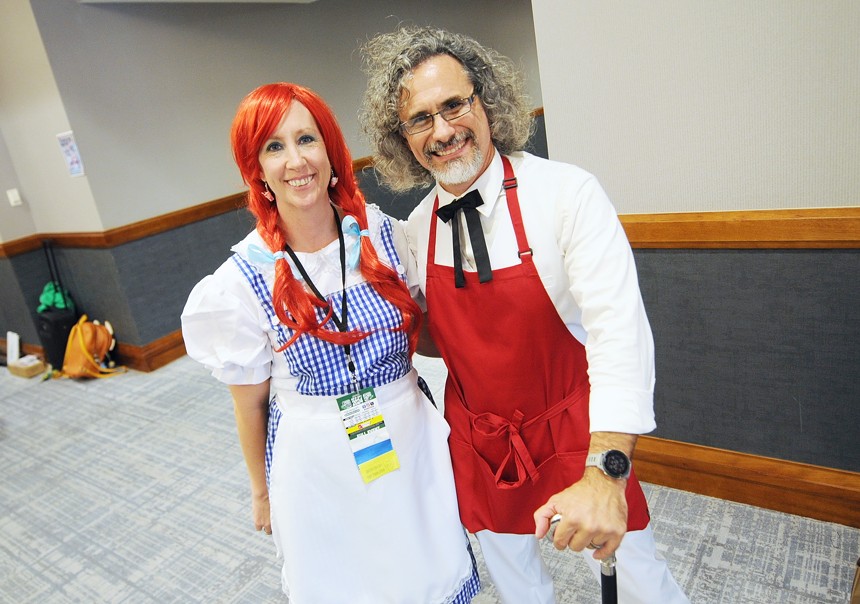 A couple dressed as Wendy and Colonel Sanders.