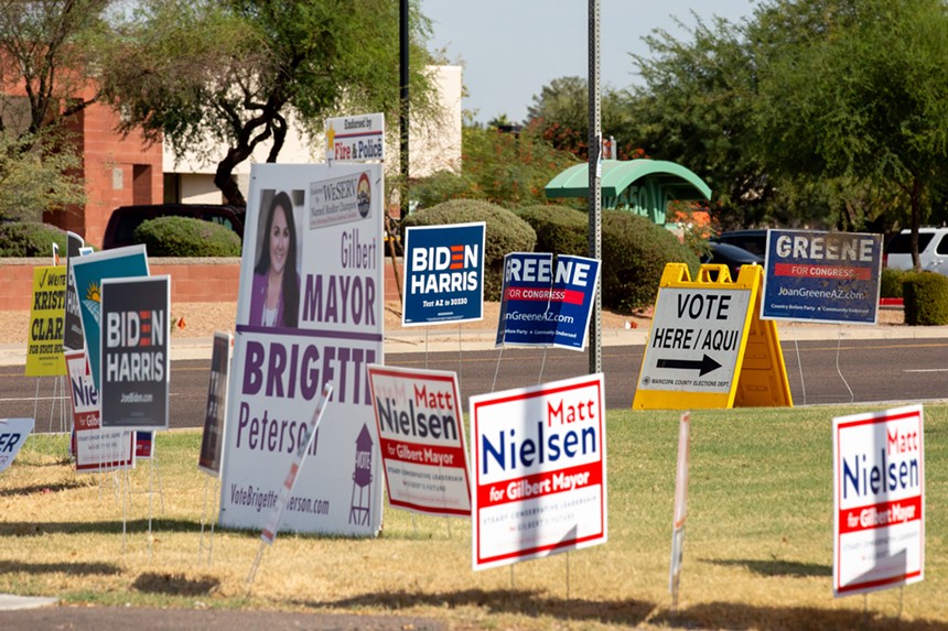 a bunch of campaign signs