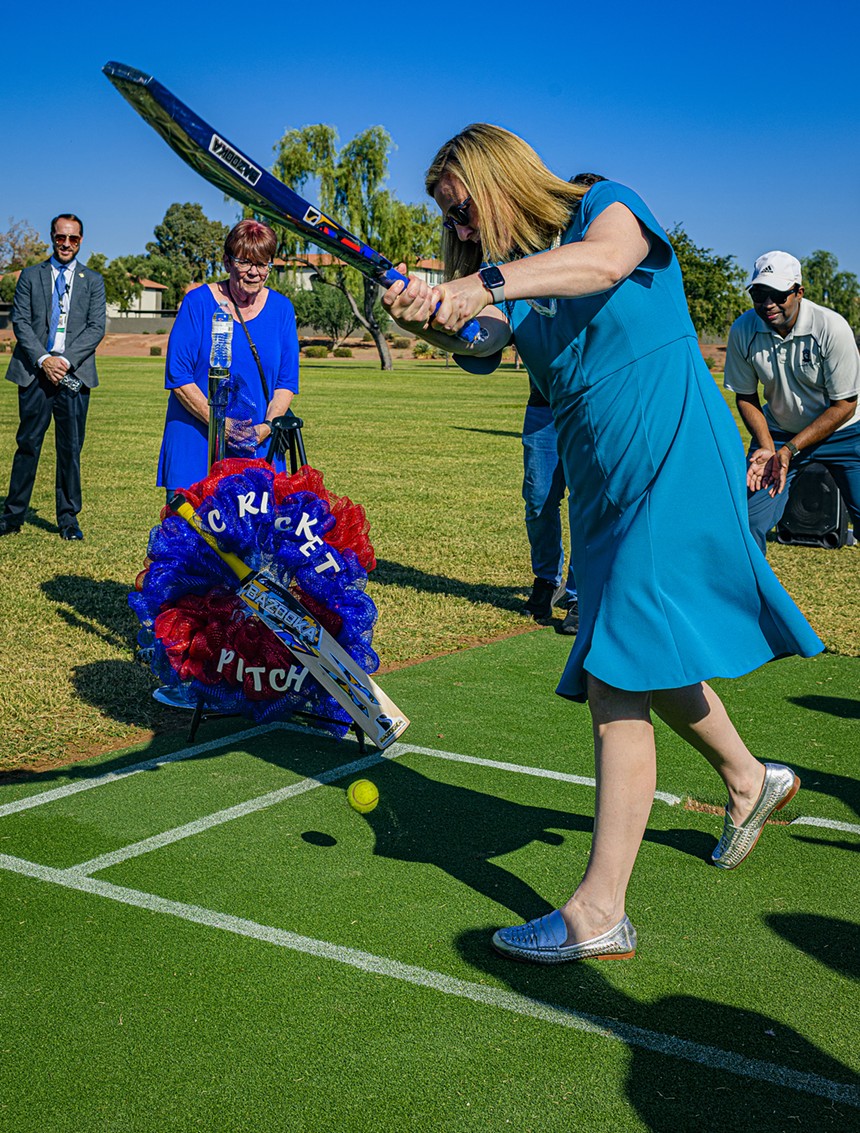 kate gallego swings a cricket bat (and appears to miss the ball)