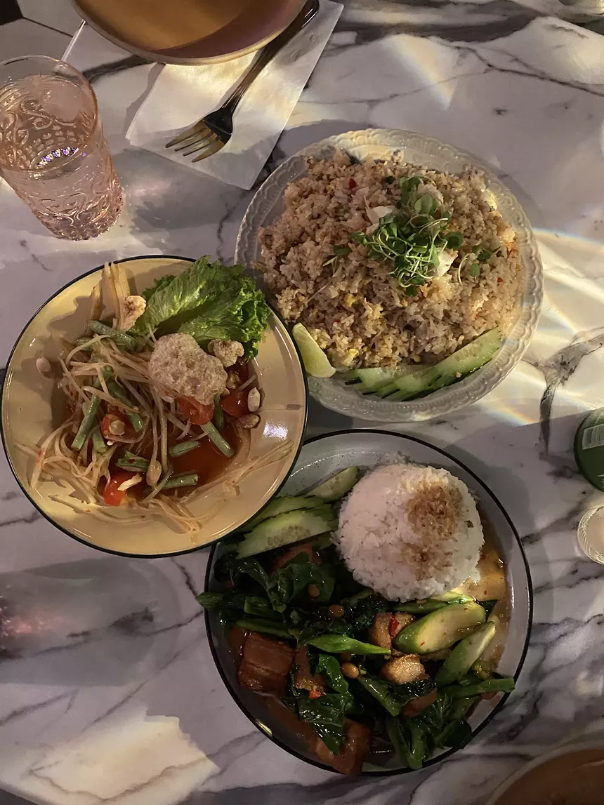 three dishes on a table, seen from above