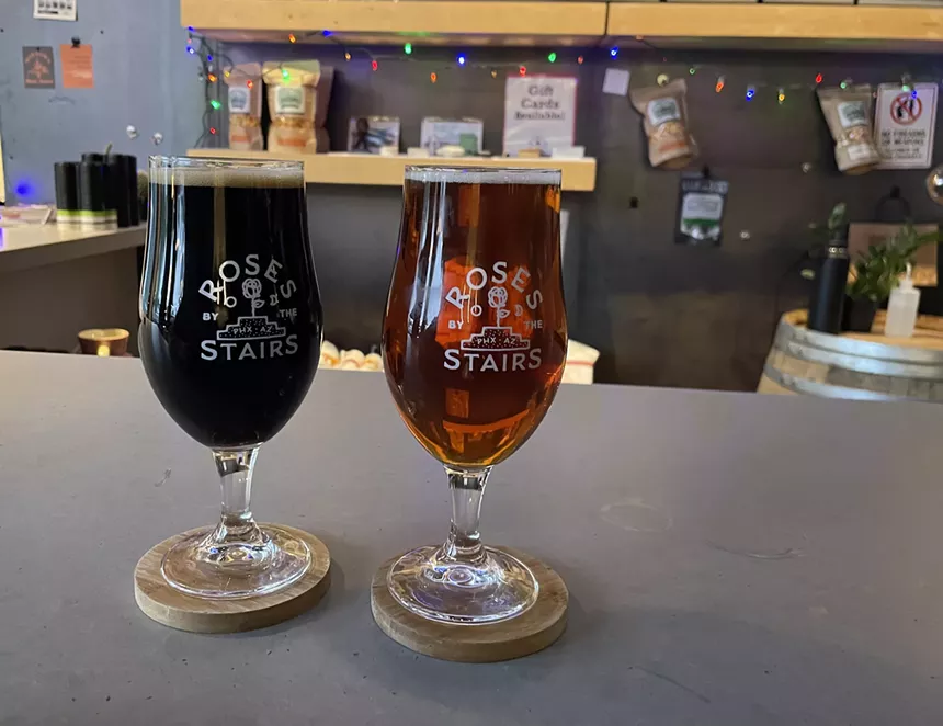 Two pints of Roses by the Stairs Brewing sit on a bar top at the central Phoenix brewery.