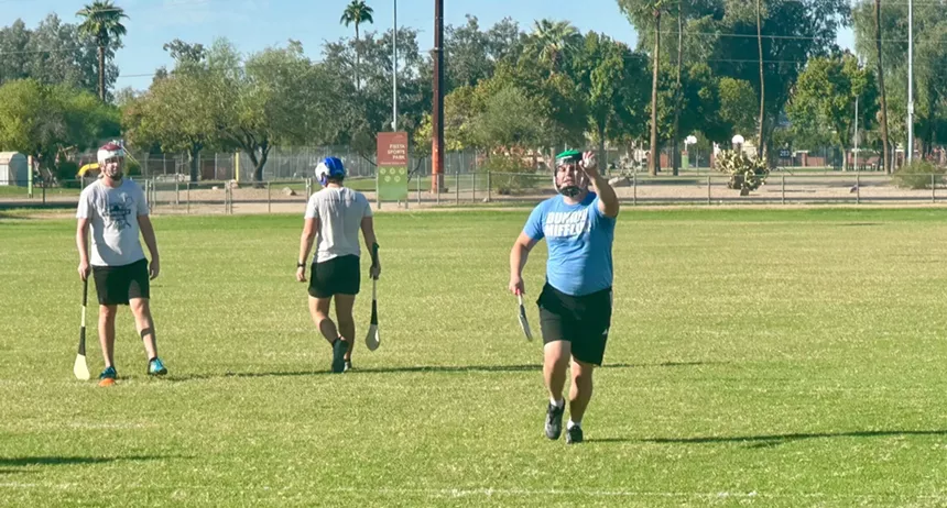 Men on a field playing sports.