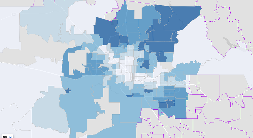 a map of maricopa county zip codes by median household income in 2023, with richer zip codes shaded darker blue