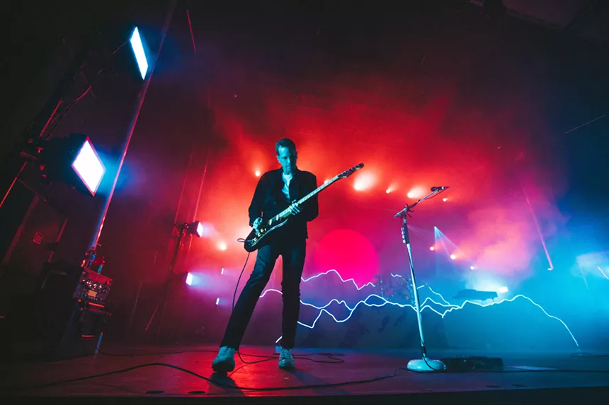 Guitar player performing on stage