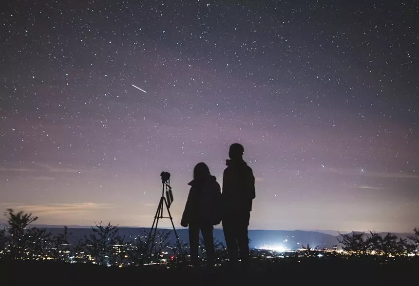 People watching the sky at night.