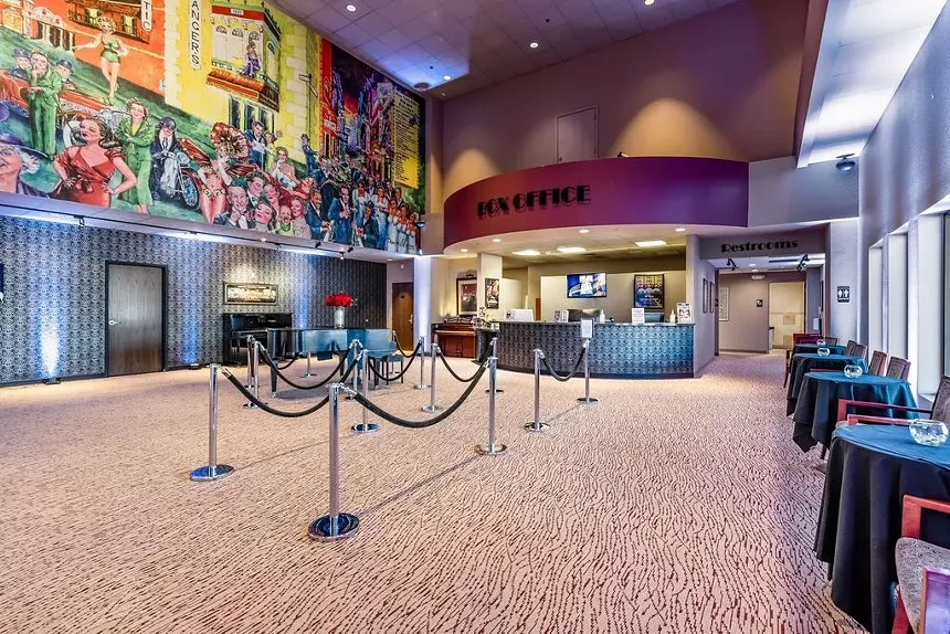 The lobby of a theater.