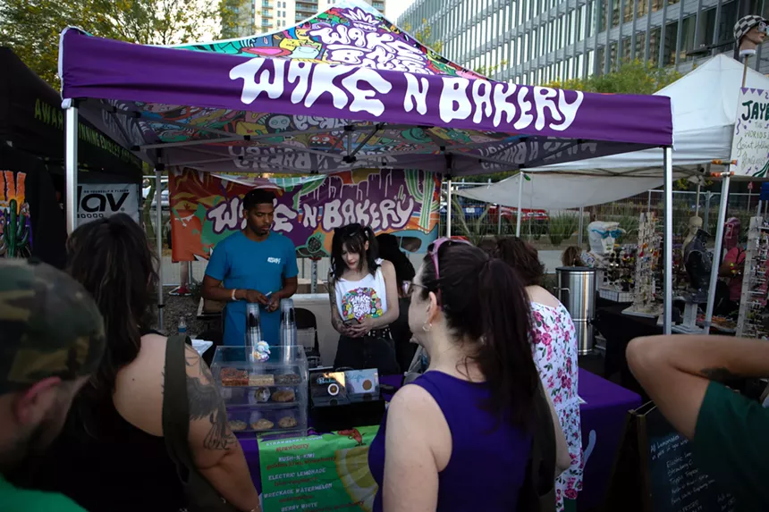 a wake-n-bakery booth at a festival