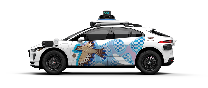 a driverless car with a sparrow design on the side