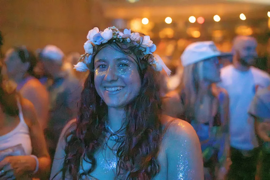 woman with flowers in her hair