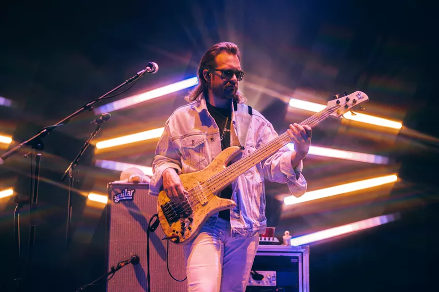 Man plays guitar