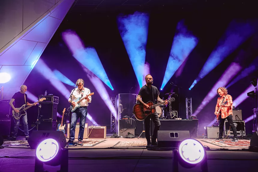 Musicians perform on stage