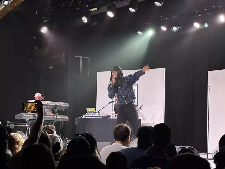Man performs on stage