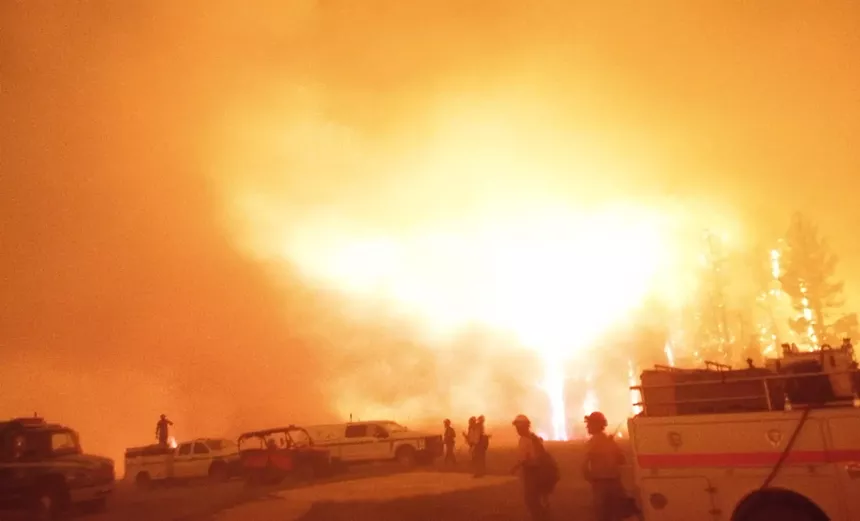 a fire blazes on a building