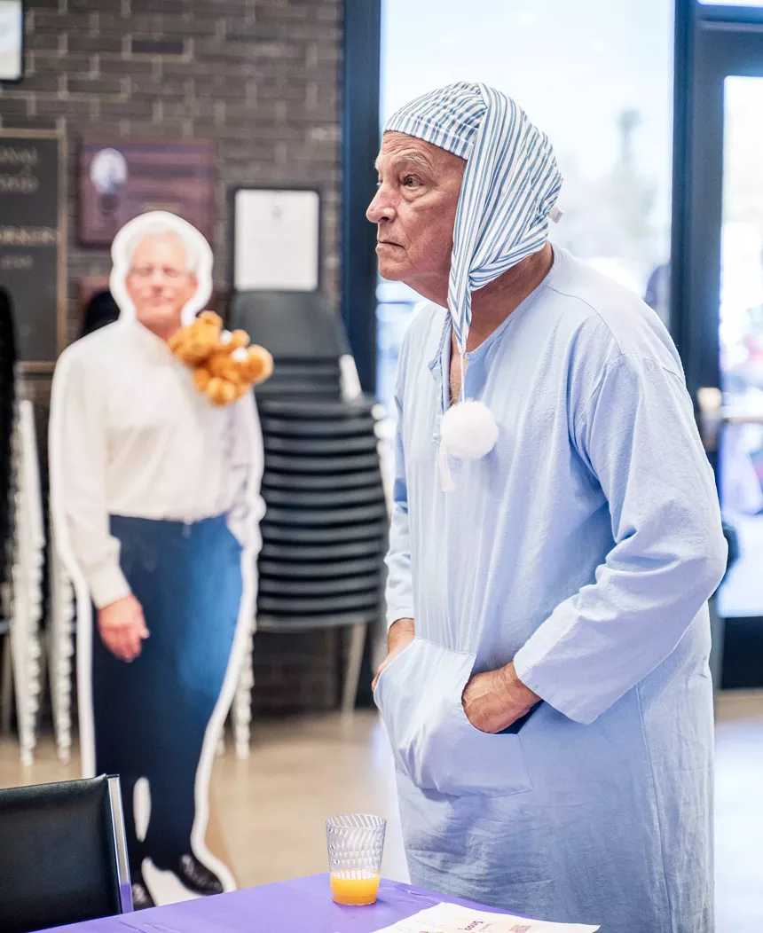 A man dressed as a sleepy Rep. David Schweikert