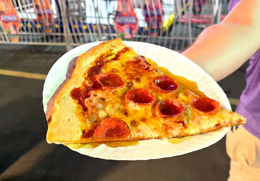 pepperoni pizza with honey on it