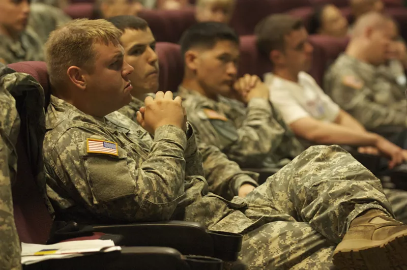 Image: Veterans Affairs specialists brief troops on the educational benefits of the GI Bill.