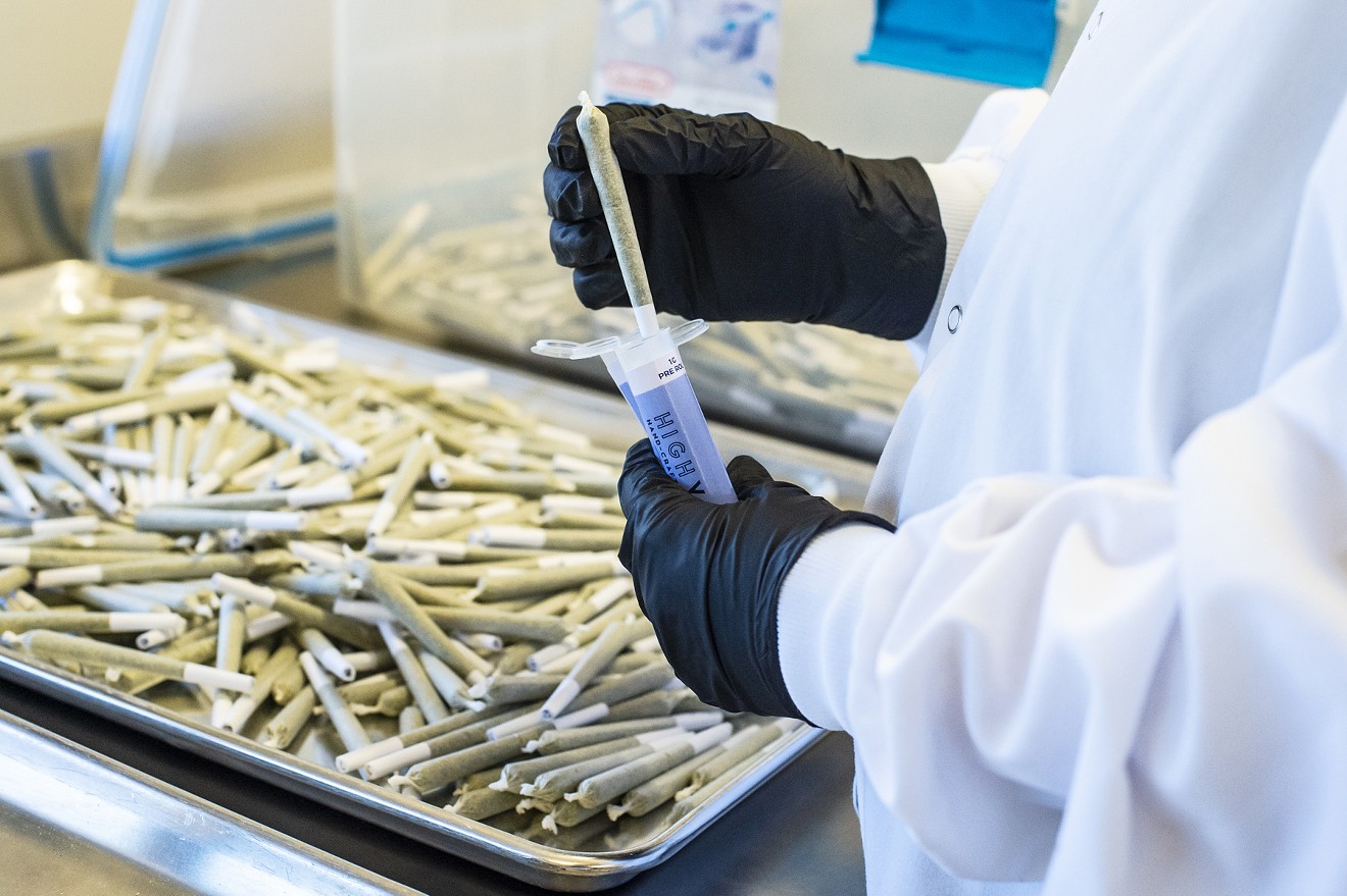 High Variety pre-rolls are finished with a human touch as they are sealed and packaged entirely by hand at The Flower Shop facility in Ahwatukee.