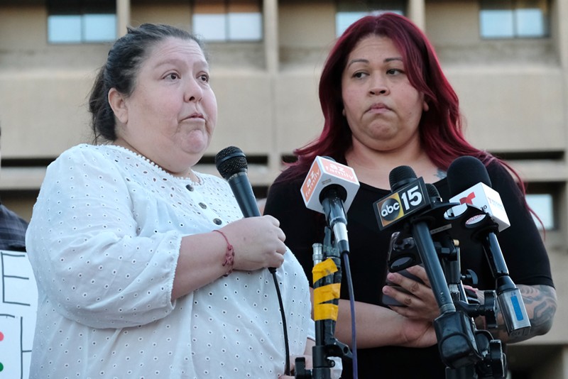 Maria Martinez (left), an aunt of Juan Carlos Bojorquez, and Anna Hernandez were among protesters on October 25 who called for answers in the police slaying of Bojorquez.