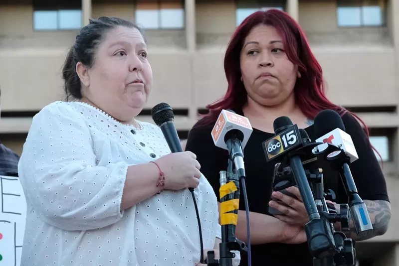 Image: Maria Martinez (left), an aunt of Juan Carlos Bojorquez, and Anna Hernandez were among protesters on October 25 who called for answers in the police slaying of Bojorquez.