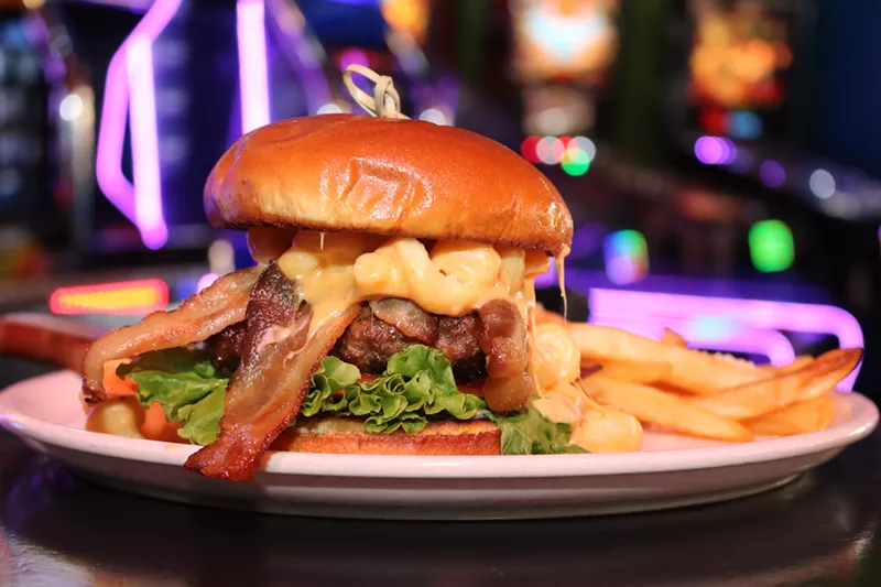 Image: Fill up before a game or concert with the Mac Daddy Cheeseburger at Carousel, one of Westgate's many restaurant and bar options.