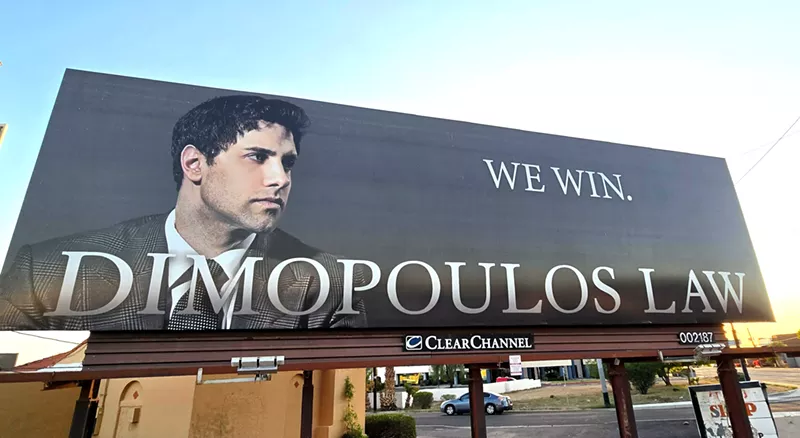 Image: a billboard with a man's face that says 'dimopoulos law: we win"