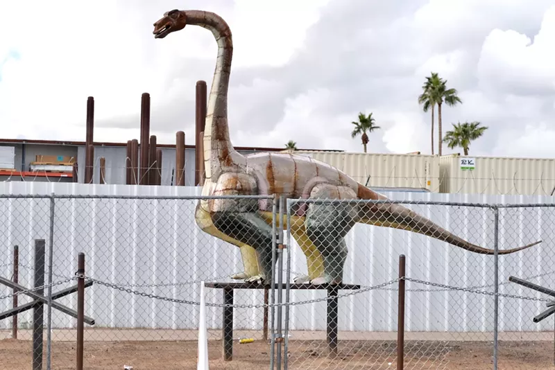 Image: A private business convinced the city to move homeless people to install a gas line but then added metal sculptures to the area.