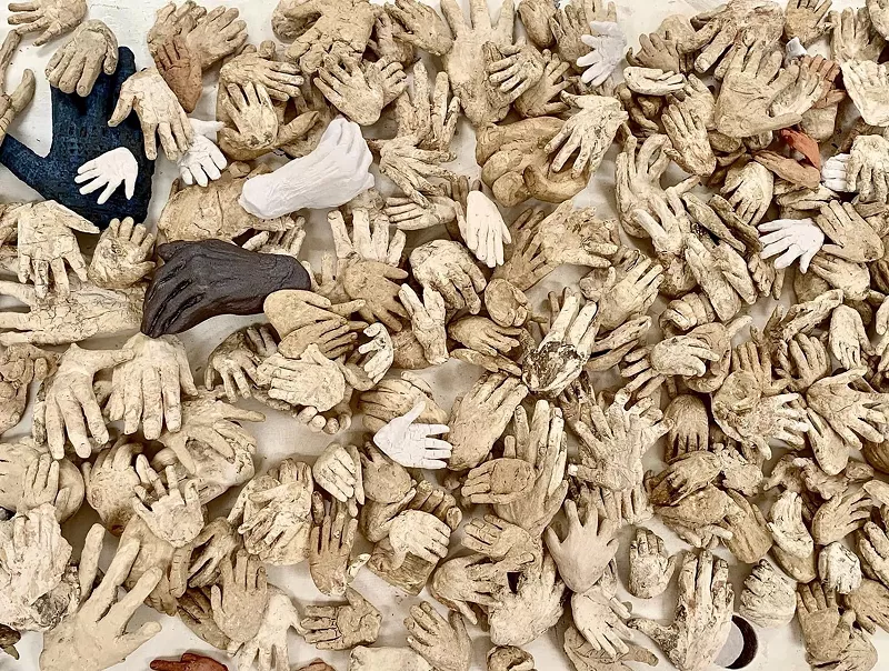 Image: For the piece Many Hands (hold me), Sannit commissioned plaster hands from strangers.