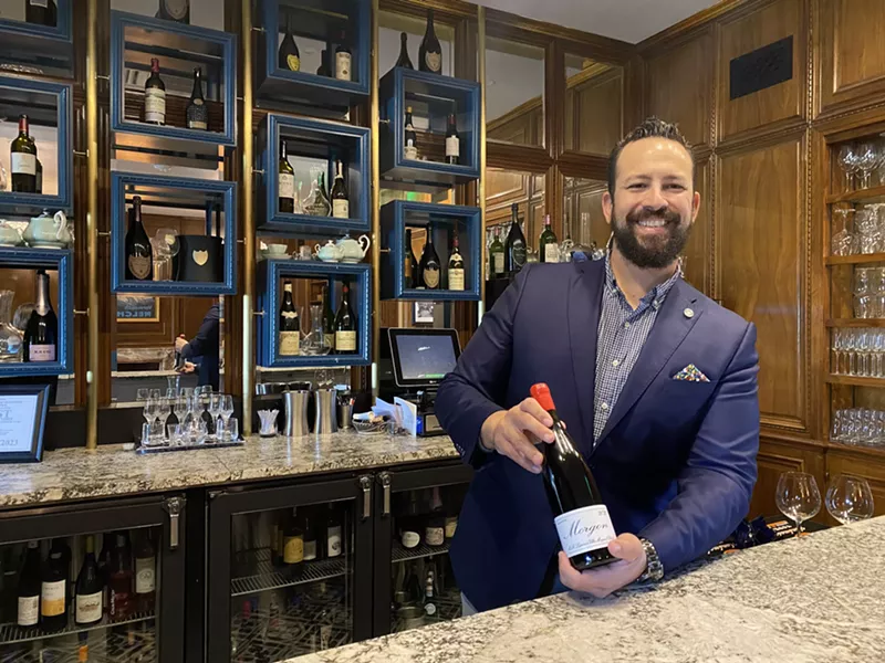 Image: Jason Caballero, shown here in Jamie's Wine Bar, became the new wine director for Wrigley Mansion Aug. 1.
